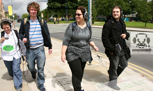 Students walking around campus listening to audio guides